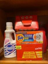 Tide laundry soap, woolite fabric wash, bounce dryer sheets, and tide washer cleaning pouches