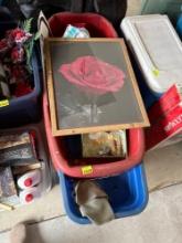 Red wagon, picture frame of a rose , towels, tape, water, jug, trespassing sign and chords