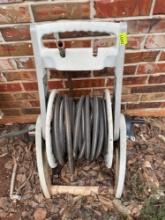 Water hose with reel and sprinkler