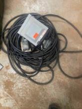 Extension cord with electrical boxes