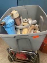 Tote with Omnifilter, misc plumbing PVC fittings, screws, supply line