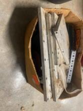Box with sanding disks, metal pieces
