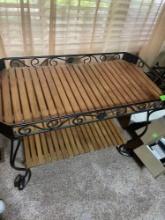 Teak and wrought iron table