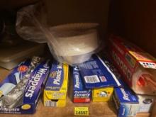 Plastic wrap, zip locks, wax paper, parchment paper, foil sheets, napkins, styrofoam bowls and more