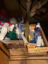 Cleaning supplies in box and wood crate