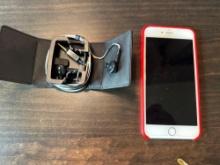 Apple phone and earbuds