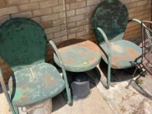 2 patio chairs and small fire pit