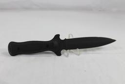 Camillus USA Boot knife. Double edged with 4.5 inch blade. Synthetic handle. Leather boot clip.
