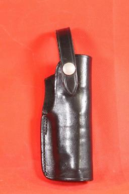 Bianchi black leather right handed snap holster for S&W 9mm.