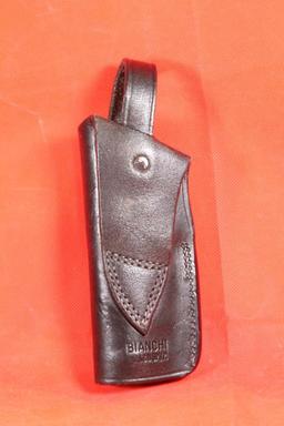 Bianchi black leather right handed snap holster for S&W 9mm.