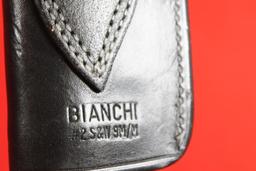 Bianchi black leather right handed snap holster for S&W 9mm.