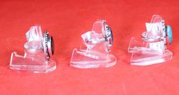 Three German silver rings. One size 6 Blue Topaz stone, one size 7 green emerald stone and one size