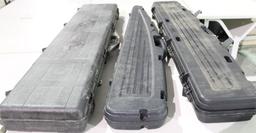 Three hard black plastic rifle cases. Like new.