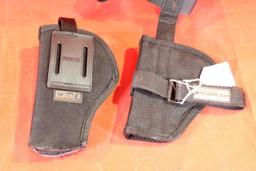 Two black nylon holsters. One right handed belt and one ankle holster. Like new.