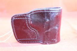 Black leather Don Hume right handed slide holster. Used.