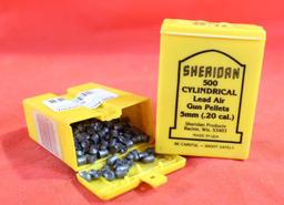 Two Sheridan 5 mm air gun pellets. One full and one partial.