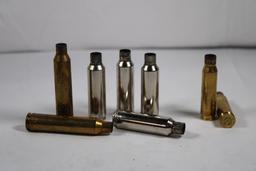 Three boxes of misc fired rifle brass, one Hornady 7MM rem mag 20 count, one Winchester 300 WSm 20