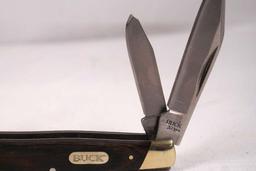 Buck Model 371 stockman with 2.75 inch main blade. Hardwood scales. NIB made in China.
