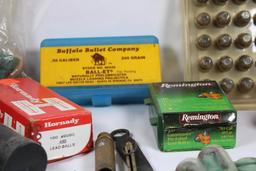 Box containing 4 boxes of .50 cal bullets, .50 cal Mag sabots, and other muzzleloader items