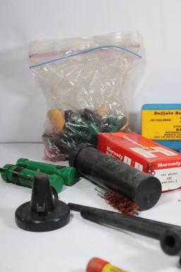 Box containing 4 boxes of .50 cal bullets, .50 cal Mag sabots, and other muzzleloader items