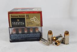 Two boxes of federal pistol. One 9mm 135 gr JHP and one 230 gr JHP. Count 40.