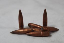 Two bags of 7mm bullets. FMJ. Count, 200 +/-.