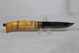 Sheath knife from Sweden or Finland. 3.25 inch blade with synthetic handle. Leather sheath has