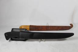 Two sheath knives. One large filet knife from Finland with leather sheath and one large Western