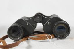 One pair of Holt's 6x30 binoculars. Used in lid less leather case.
