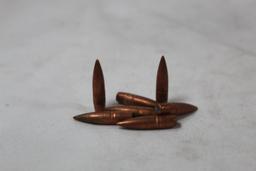 One bag of 7mm bullets. FMJ. Count 100 +/-.