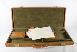 Canvas and leather break-down rifle case with keys. Used, in very good condition.