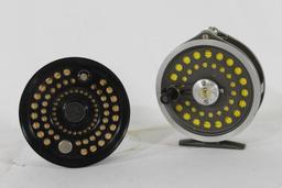 One Orvis Magnalite fly reel in bag and one Orvis extra fly spool for different fly reel. Both have