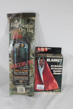 Mad Dog fowl weather dry bag and one all season, all reason outdoor blanket. In packages.