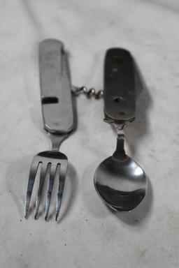 Black nylon case, military rifle sling, ear plugs and one eating utensils fold set. Used.