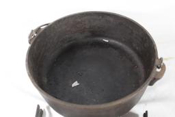 Lodge 10" Dutch oven with lid handle and coal stand. Used.