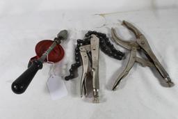 One hand drill and two vise grips. Used.