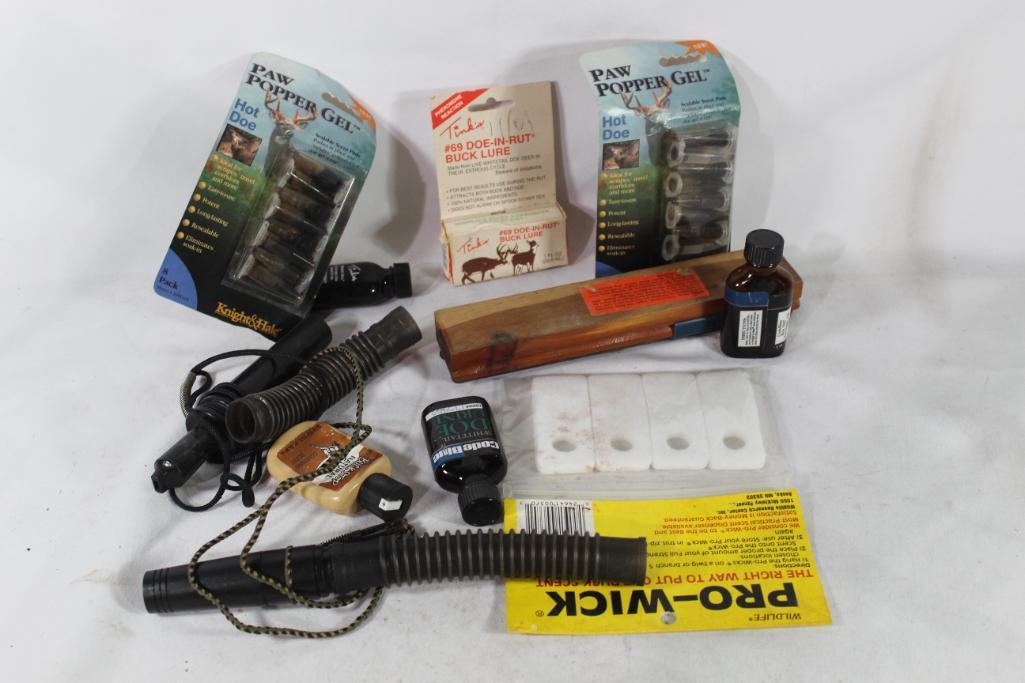 Nylon ditty bag with deer attractants, steel knife sharpening rods, etc.