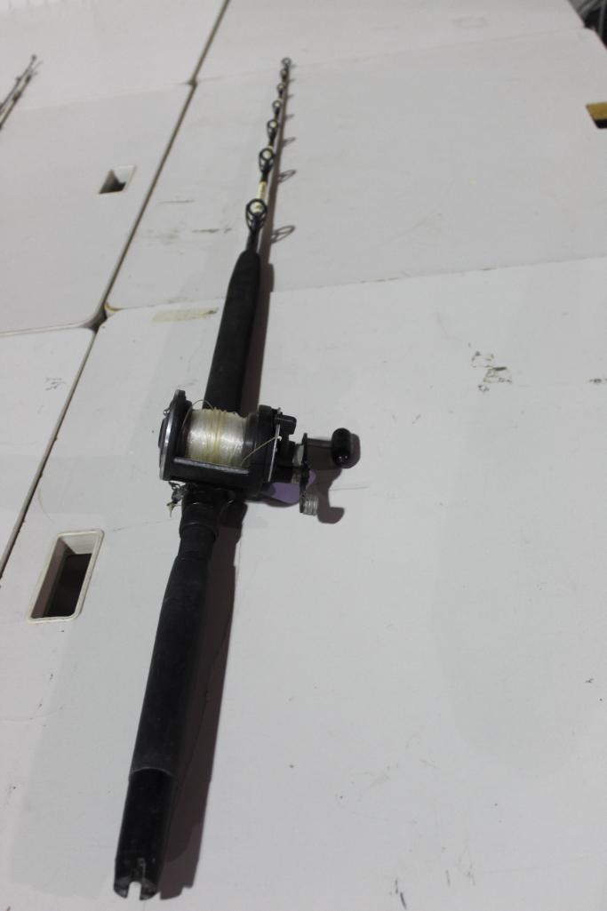 One PENN stand-up slammer 5 ft 6" deep sea bait fishing rod and Penn bolt on bait reel. Used. Will