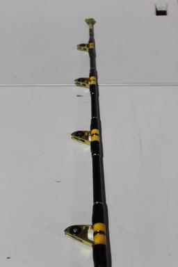 One Tycoon Fin Moor 7ft 7", 80lb bent butt deep sea trolling rod in black plastic rod cover. Used.