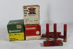 Three boxes of 410 shotshells One full #4 Western 3" count 25 , one partial Remington #71/2, 3",