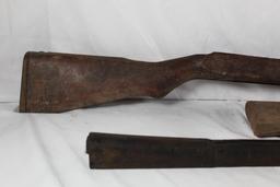 Two wood rifle stocks and one wood forearm. Used.