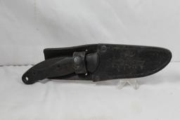 Kershaw sheath knife with 3.75 inch blade. Leather sheath. In used condition. Made in China.
