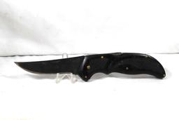 G96 Brand folding hunter with 4.0 inch blade. Lockback. Used.