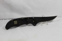 G96 Brand folding hunter with 4.0 inch blade. Lockback. Used.