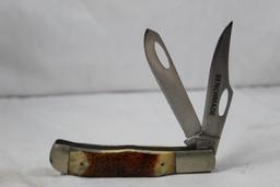 Parker Cutlery Company Trapper with 3.25 inch blades. Burnt bone scales. Fair condition with