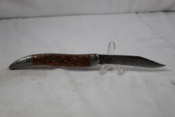 Remington fish knife Model R953. 3.5 inch blade has been broken. Jigged wood scales. Used.