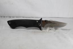 CRKT large folding hunter with 4.0 inch partially serrated blade. Liner lock. Synthetic handle. Used