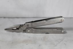 Leatherman super tool. Multi-tool in good condition in a Schrade belt sheath.