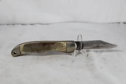 Schrade Old Timer Liner lock hunter with 3.25 inch blade. Saw cut Delrin scales. Approximate .75