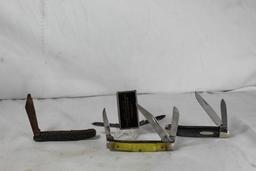 Small two blade Colonial Range, small three blade Stockman with yellow scales, small two blade